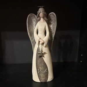 Elegant Angel Figurine with Star